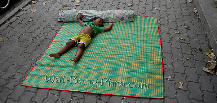 Baby sleeps in temple